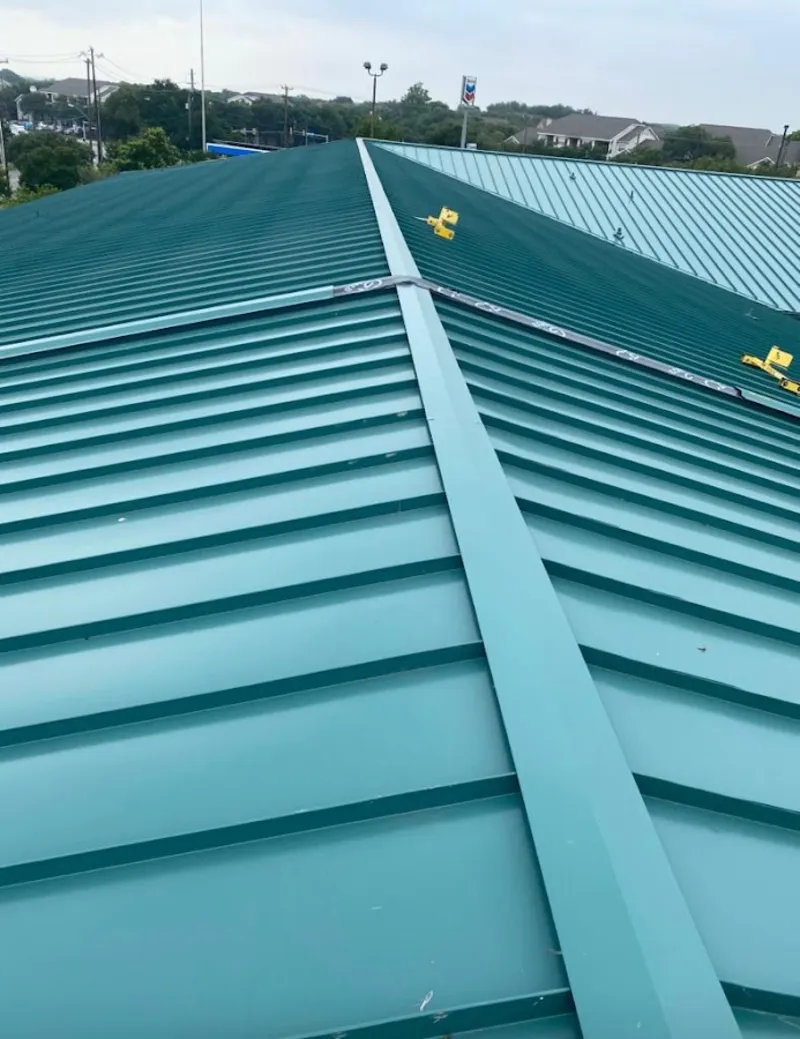 Green commercial metal roof ridge and valley for Metal Roof Repair in Marvin