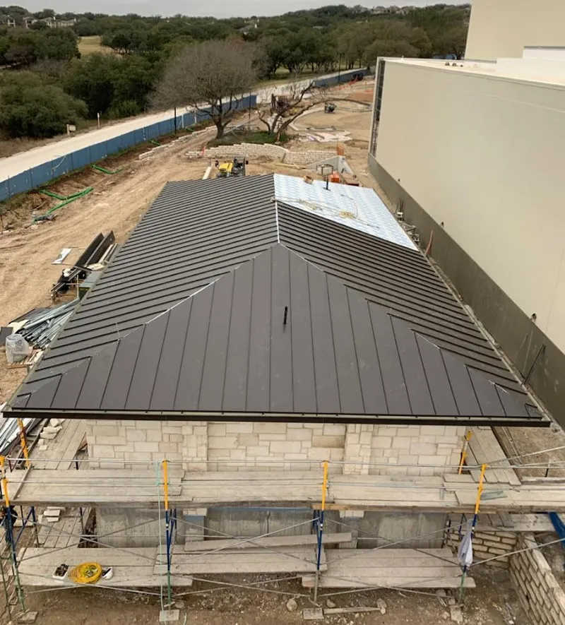 Metal roof new construction with scaffolding in Marvin