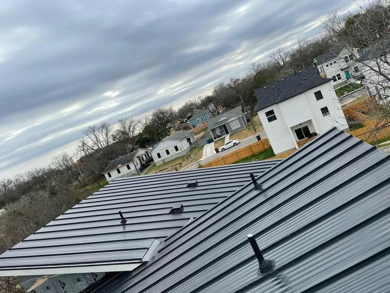 Standing seam metal roof panels with vents for Skylight Repair in Marvin